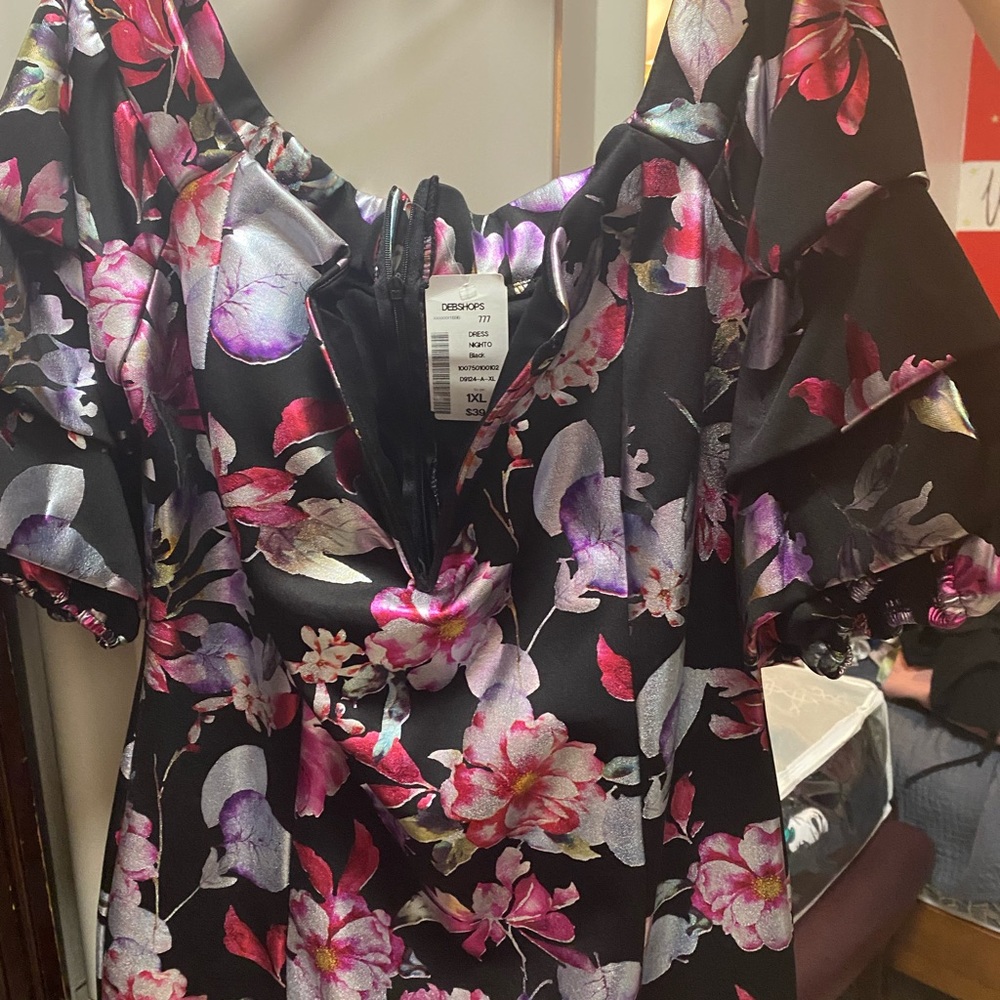 This off shoulder metallic floral dress. Deep V wire and puffy ruched sleeves